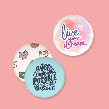 Three circular buttons with motivational phrases on a pink background