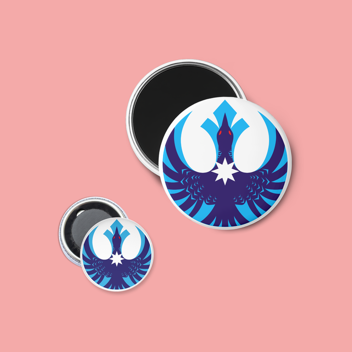 Two round magnets with a blue and white loon on a pink background