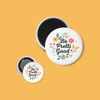 A set of floral magnets with the text Be Pretti Good 